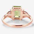 Back view of emerald cut peridot engagement ring in rose gold. Vintage style, handmade ring, bridal ring.