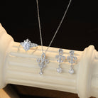 Floral jewelry set with ring, necklace, and earrings with moissanite