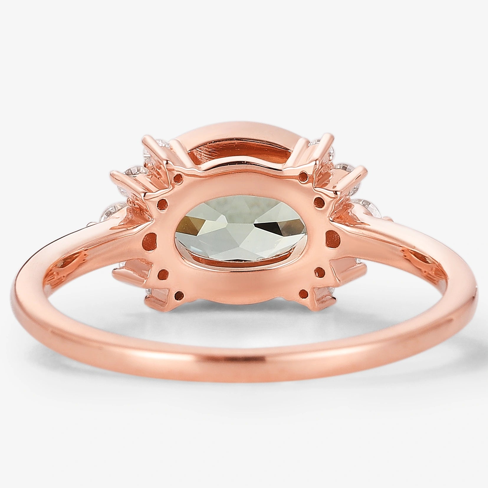Rose gold oval green sapphire engagement ring with moissanite accents, vintage style