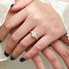 Nature-Inspired Pear Cut Moissanite Bezel Engagement Ring with Trillion Accent Stones - Emily