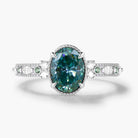 Classic Oval Cut Green Moissanite Bezel Engagement Ring