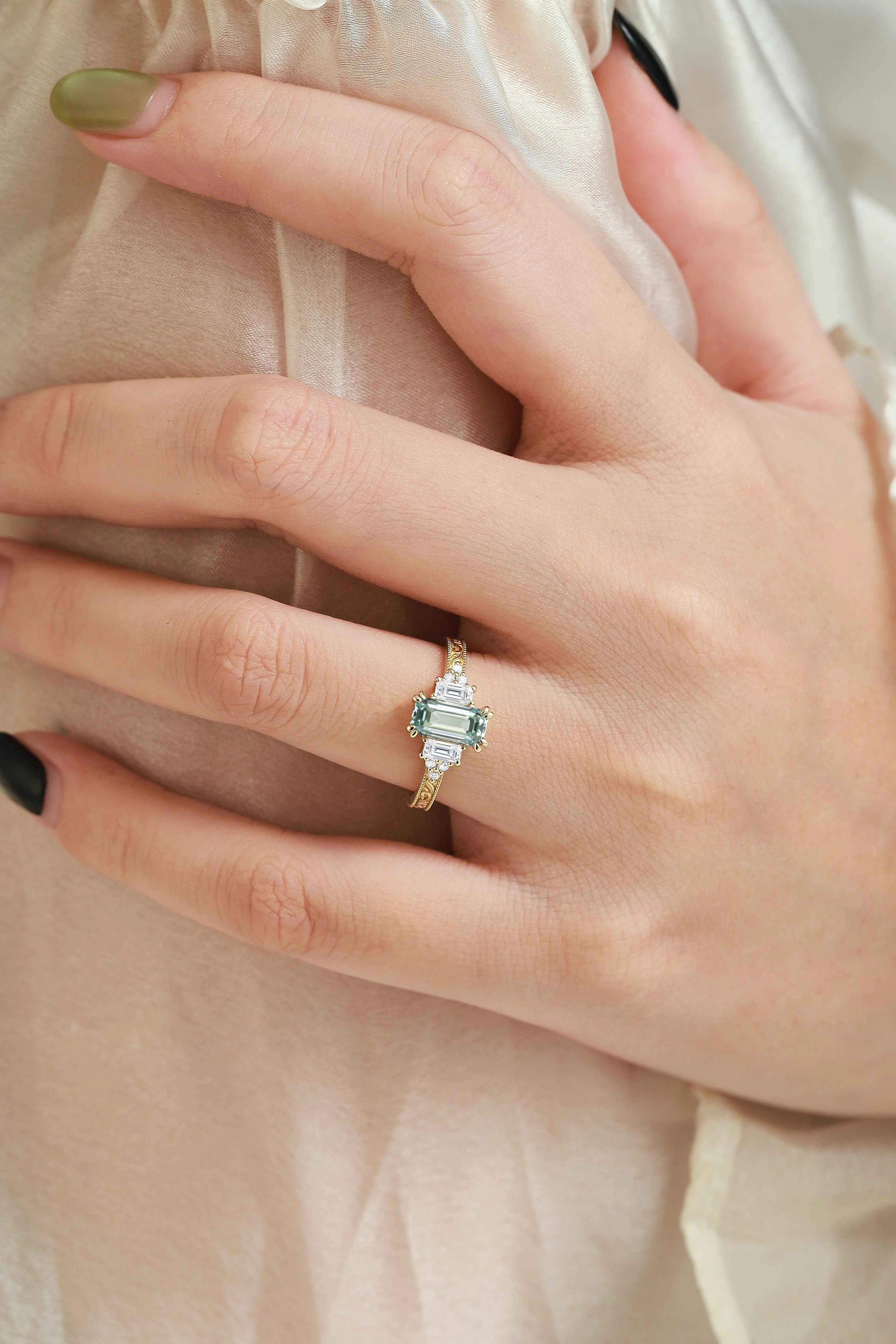 Emerald Cut green Sapphire Three-Stone Bezel Engagement Ring