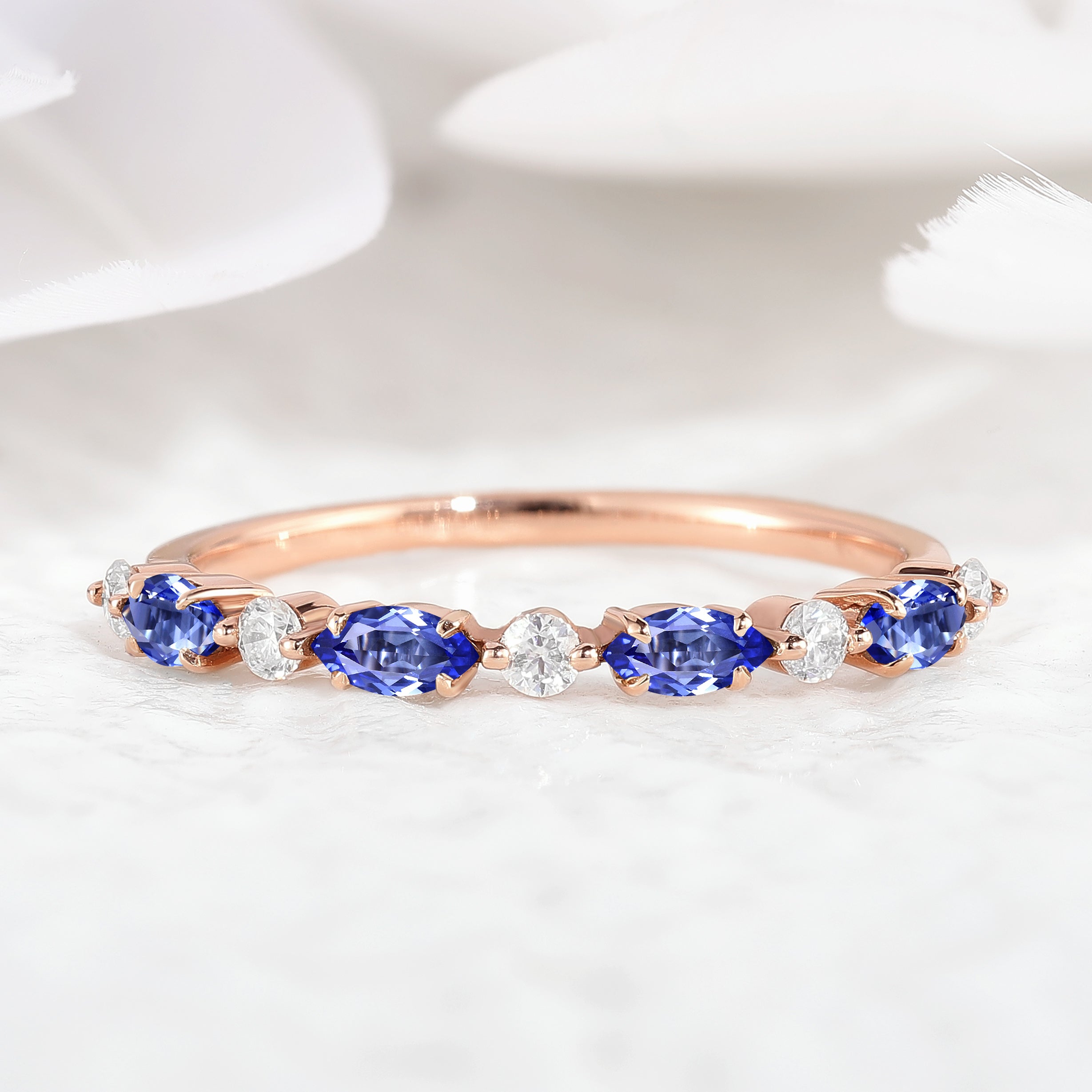 Rose gold wedding band with marquise cut blue sapphires and round moissanites. Bridal set ring set.