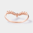 Rose gold curved wedding band with moissanite accents. Vintage bridal ring set.