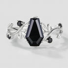 Black onyx coffin cut engagement ring with leaf detail