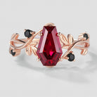 Rose gold coffin cut ruby ring with leaf accents