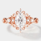 Vintage oval cut moissanite engagement ring in rose gold. Classic elegance.