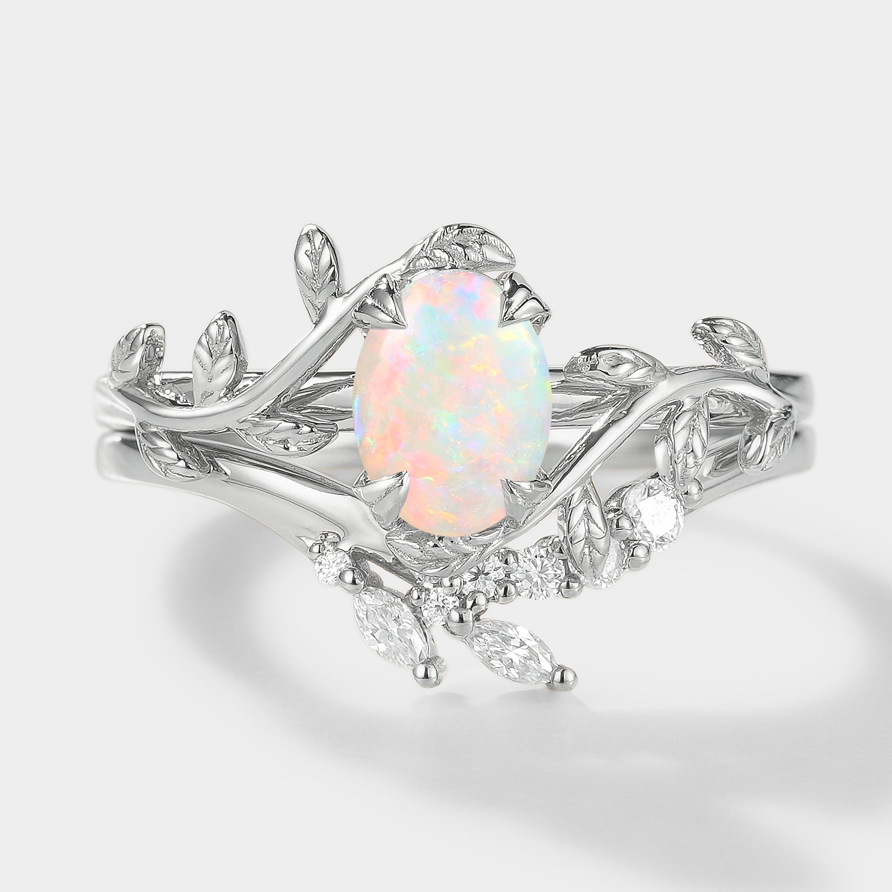 Oval opal leaf engagement ring set