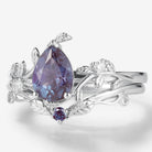 Pear Cut Alexandrite Wedding Ring Set, leaf design with moissanite accents, vintage style, white gold.