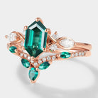 Rose gold lab emerald engagement ring set. Hexagon-cut emerald with moissanite & emerald wedding band. Bridal set.