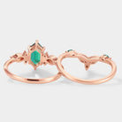 Rose gold ring set with hexagon cut lab emerald engagement ring and wedding band