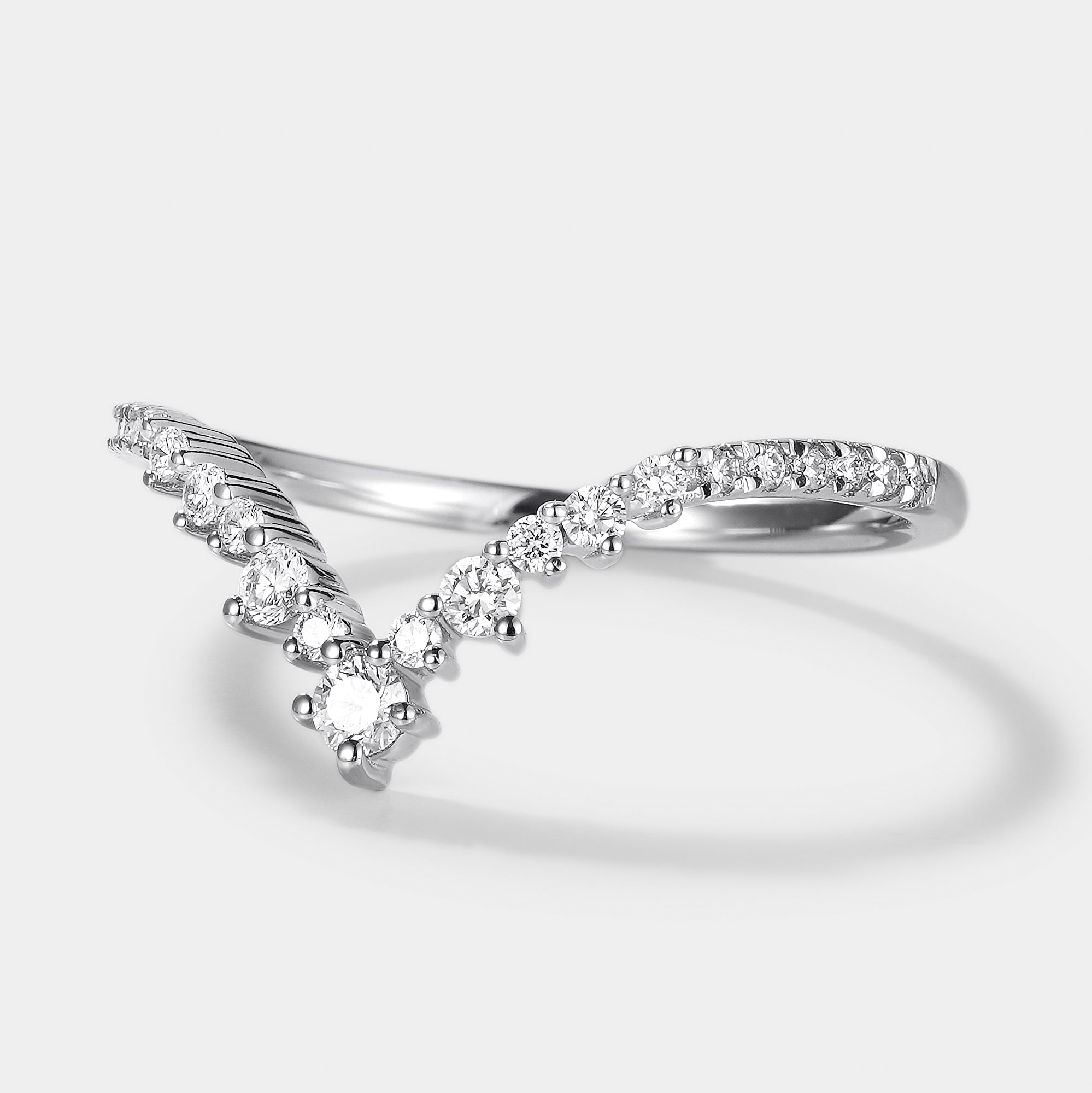 Elegant chevron moissanite wedding band in white gold