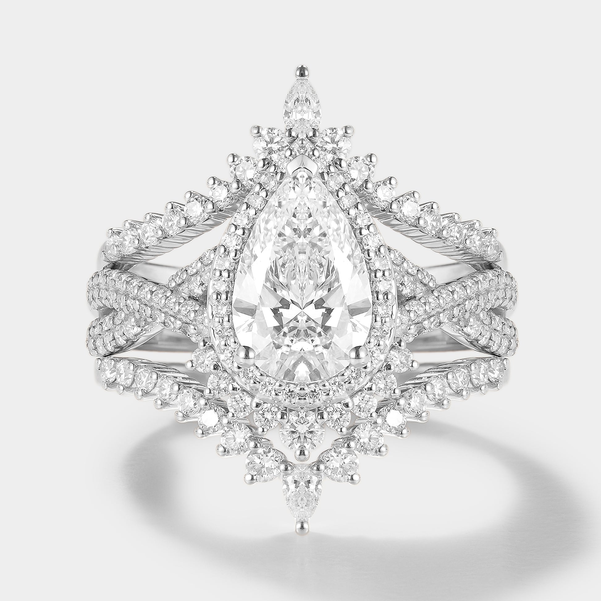 Elegant Pear Cut Moissanite Engagement Ring Set