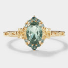 Oval Green Sapphire Engagement Ring with Leaf Pattern in Gold