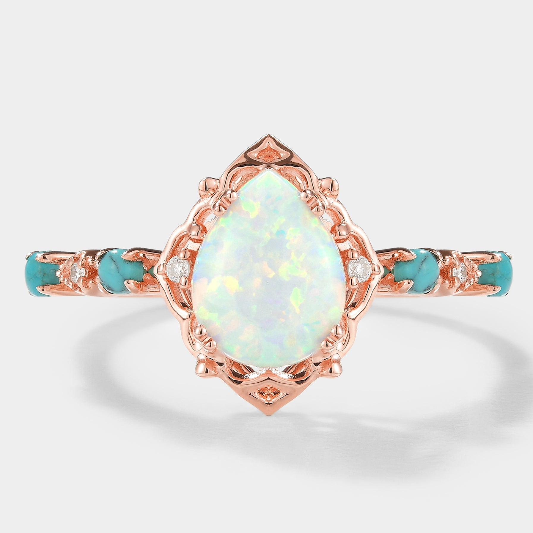 Vintage pear-cut opal ring with turquoise and diamonds