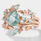 Rose gold moss agate engagement ring set with leaf and moissanite accents, vintage style, wedding rings.