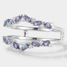 Alexandrite enhancer wedding band. moissanite & color-changing Alexandrite stones