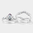 Alexandrite engagement ring set with enhancer band, nature-inspired design