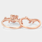 Rose gold leaf engagement ring set with moissanite
