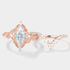 Rose gold marquise moissanite engagement ring set with leaf accents