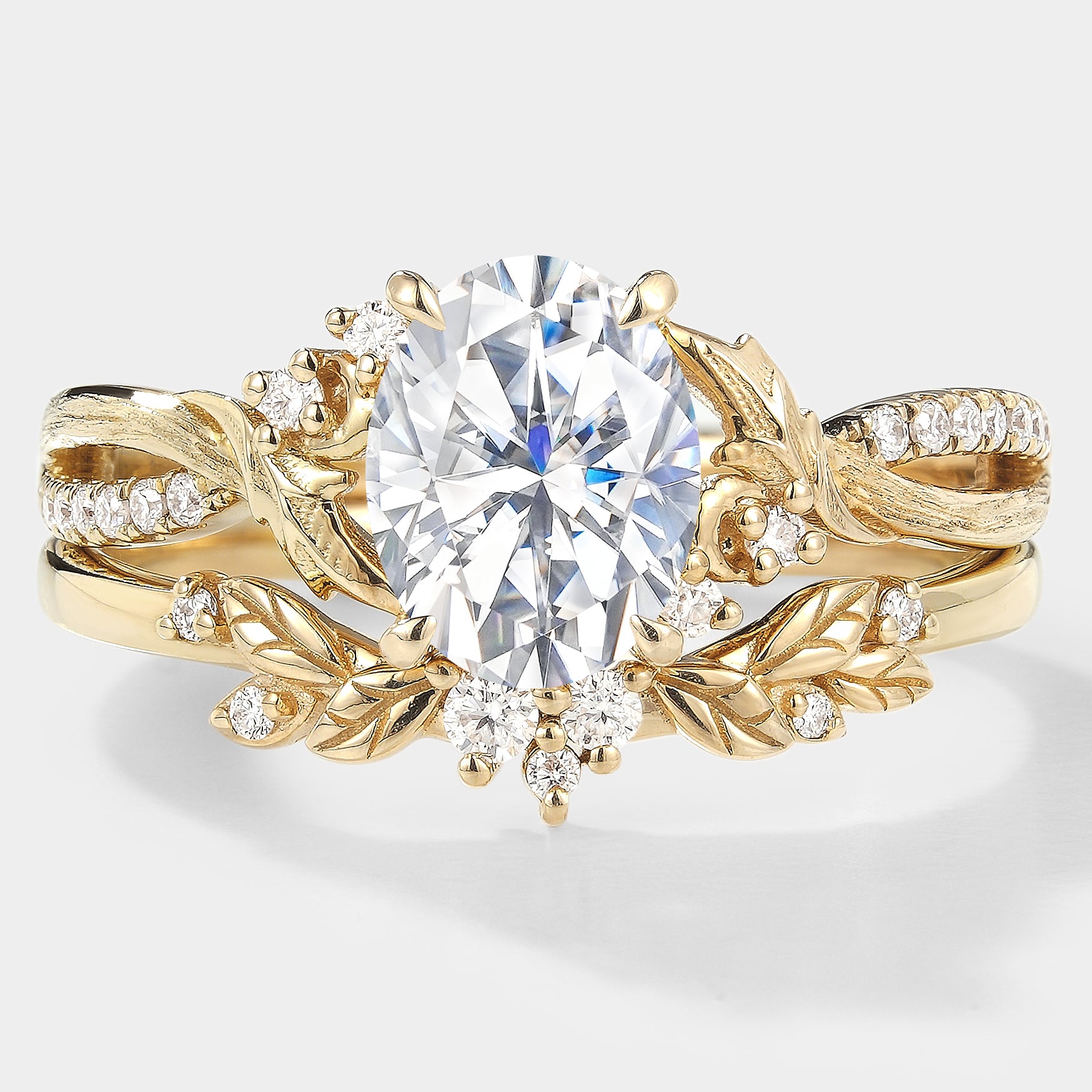 Nature-inspired moissanite engagement ring with leaf and bark texture