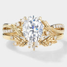 Nature-inspired moissanite engagement ring with leaf and bark texture