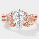 Rose gold moissanite ring set with leaf and floral design
