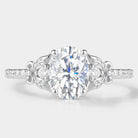 Oval cut moissanite leaf engagement ring
