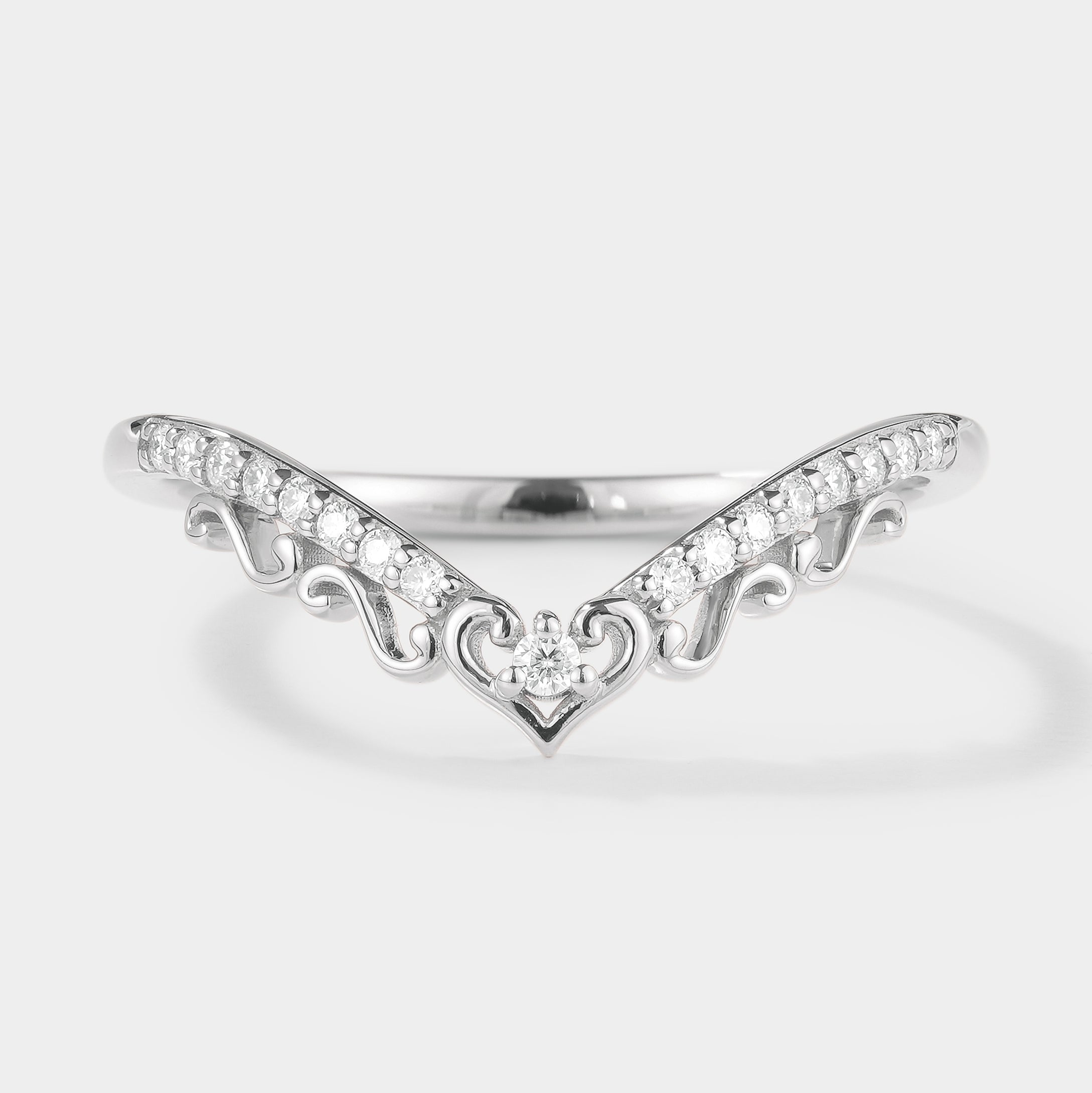 Nature-inspired Chevron wedding band with moissanite stones