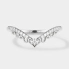 Nature-inspired Chevron wedding band with moissanite stones