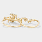 Nature-Inspired Bridal Set: Oval Moissanite Ring with Leaf Wedding Band