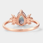 Rose gold pear-cut alexandrite ring with floral moissanite accents, back view, bridal set, vintage design