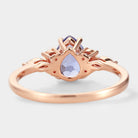 Rose gold pear cut cornflower sapphire engagement ring, leaf design, bridal set, vintage style.