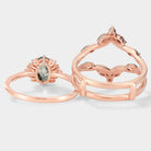 Rose gold moss agate engagement ring set with enhancer band. Vintage style, oval cut, and moissanite accents.