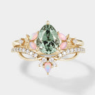 Nature-inspired green sapphire engagement ring set with opal accents