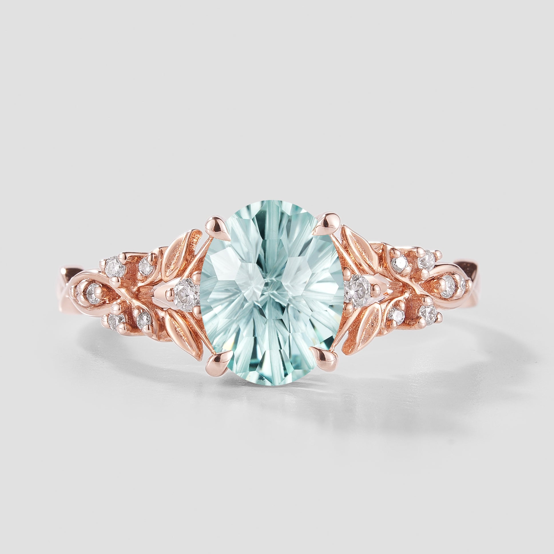 Oval Cut Aquamarine Leaf Engagement Ring In Rose Gold