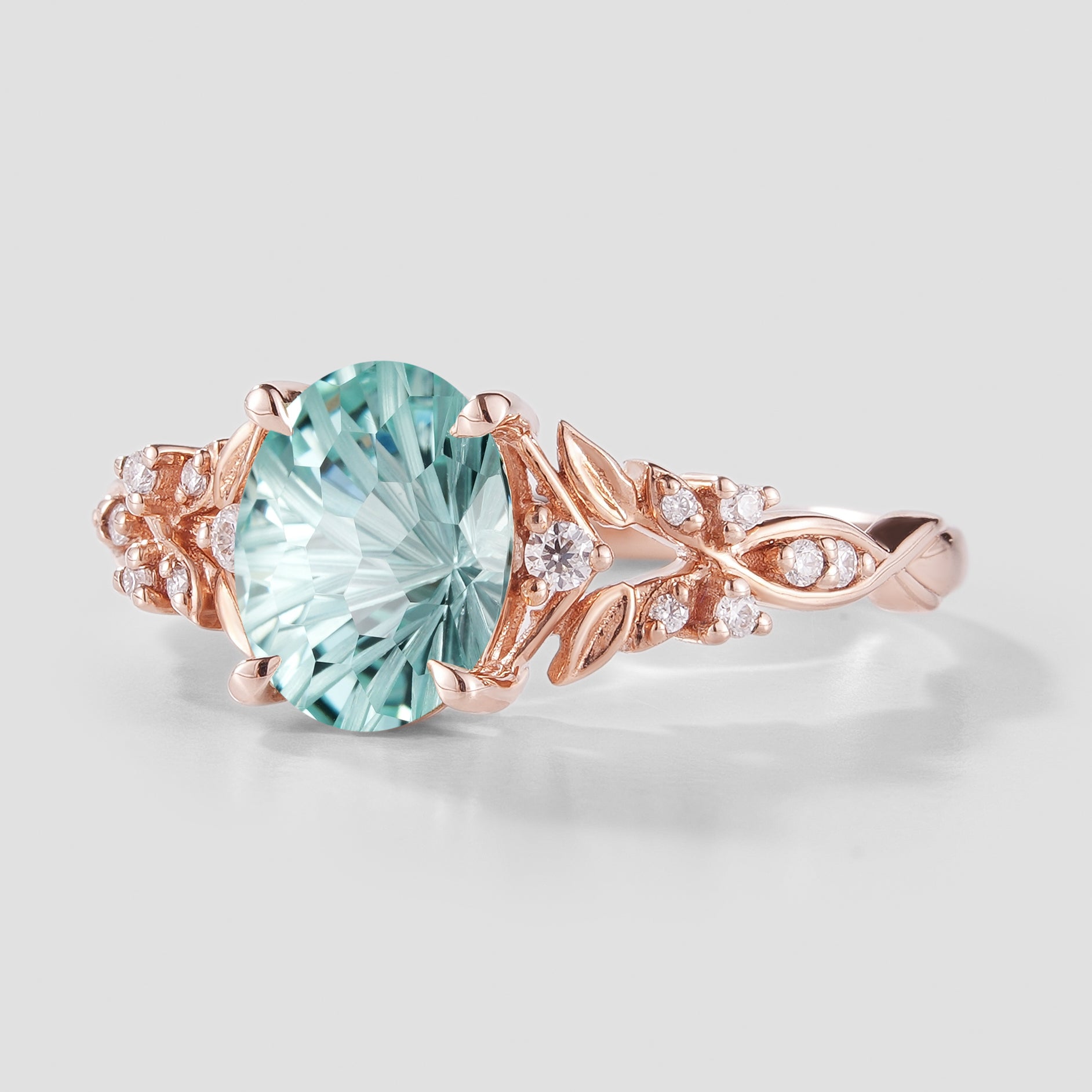 Oval Cut Aquamarine Leaf Engagement Ring In Rose Gold