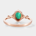 Rose gold emerald engagement ring, nature inspired design, oval cut emerald.