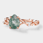 Nature-inspired moss agate engagement ring with vine leaf design
